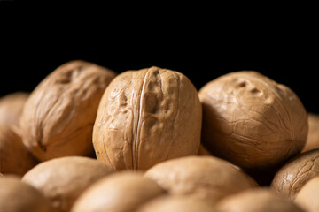 closeup of ripe walnuts texture background. 