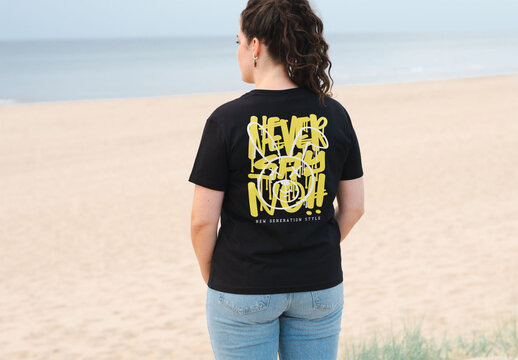 Mockup of woman wearing t-shirt , customized design on beach