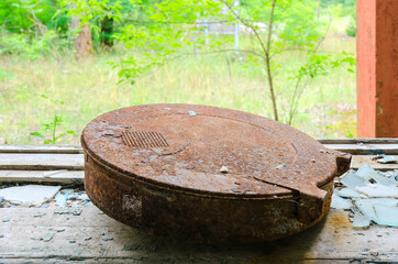 Old rusty film box on windowsill in former House of Culture in resettled village of Pogonnoye in exclusion zone of Chernobyl, Belarus