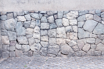 Stone wall background grey texture on block floor