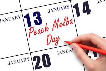 January 13. Hand writing text Peach Melba Day on calendar date. Save the date.
