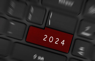 Modern black computer keyboard with return key coloured red, 2024