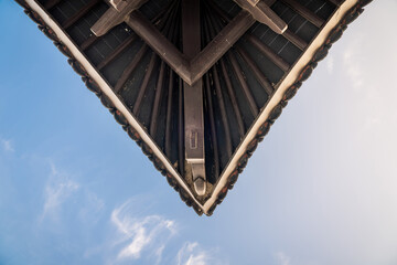 Detailed close-up of ancient buildings and blue sky and white clouds in Anhui Province, China