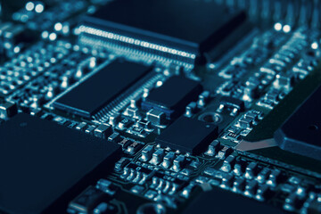 Modern electronic circuit board with processor, integrated circuits and surface mounted passive components close up. Technology background - obrazy, fototapety, plakaty
