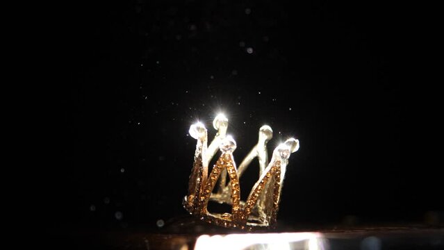 Royal crown in a ray of light