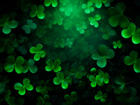 The green background of the copy area with clover and gold coins for St. Patrick's Day. Bokeh. Blur. 