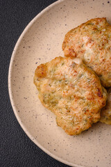 Delicious fresh fried minced fish cutlets with spices and herbs