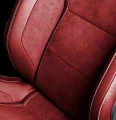 Car inside. Interior of prestige modern car. Comfortable red leather seats. Perforated leather...