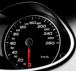 Close up shot of a speedometer in a car. Car dashboard. Dashboard details with indication lamps....