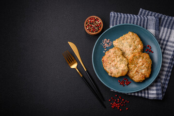 Delicious fresh fried minced fish cutlets with spices and herbs