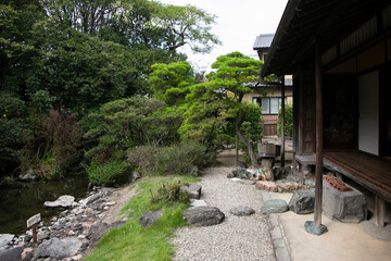 Views of an old Japanese style house with its garden and a small lake in Yanagawa, Fukuoka, Japan.