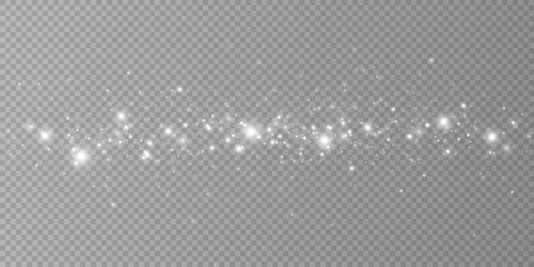 Particles of white magic dust. Shining light particles.Christmas glitter particles. Light effect on a transparent background	