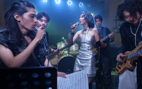 Young band performing on stage