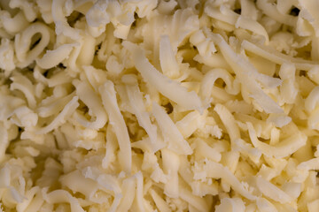 grated cheese in large quantities at home
