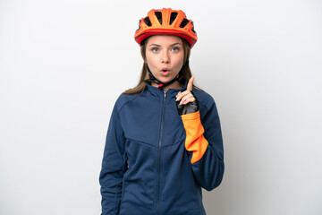 Young cyclist Lithuanian woman isolated on white background intending to realizes the solution while lifting a finger up