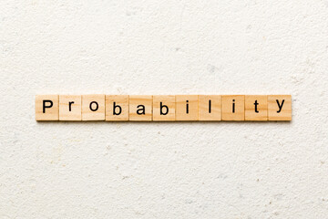 probability word written on wood block. probability text on table, concept
