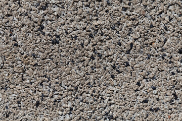 Crushed granite stones wall - close up