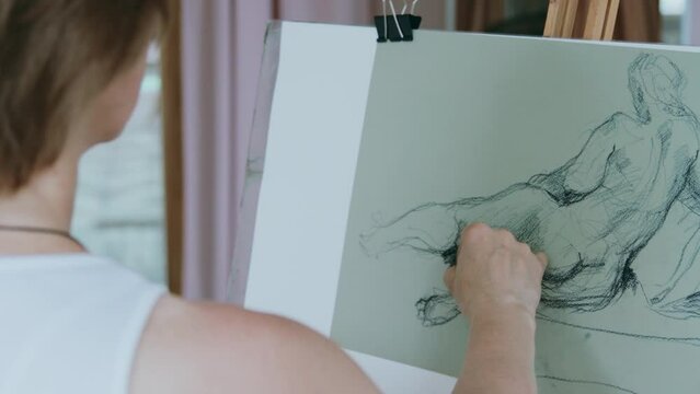An artist at work in her studio