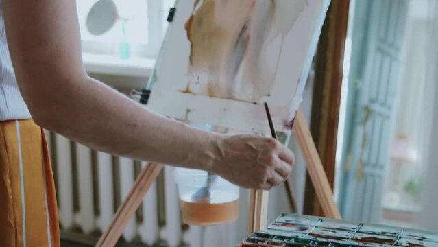 An artist at work in his studio