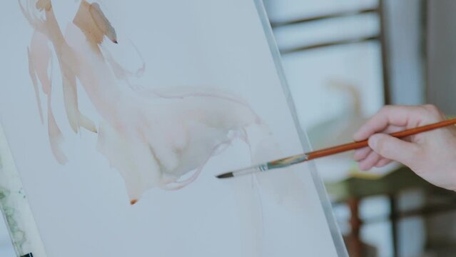 An artist at work in his studio