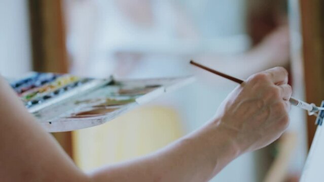 An artist at work in his studio