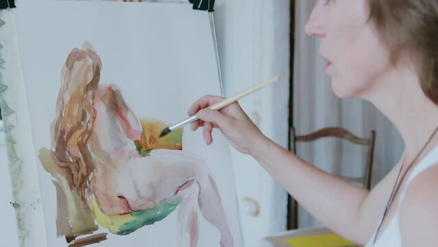 An artist at work in his studio