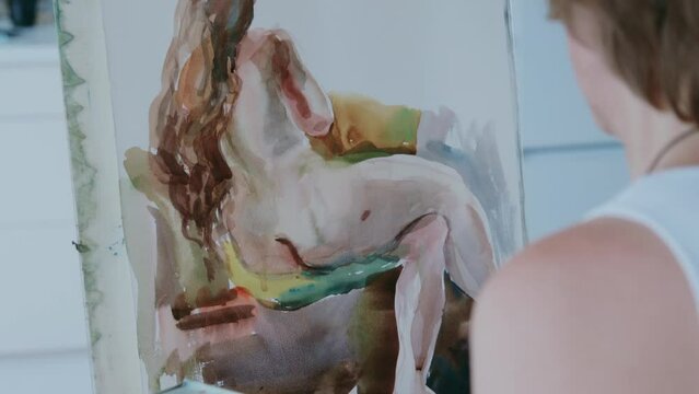 An artist at work in his studio