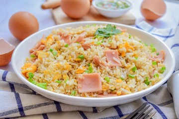 fried rice with ham and egg, on a white background,thai food,asian food