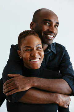 Contemplative couple against white background