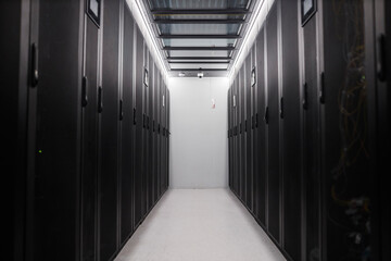 Aisle between rack cabinets in server room