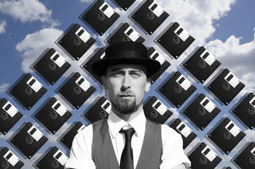 Collage with bearded man in hat with a floppy disks on background	