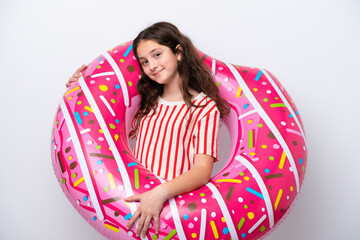 Little caucasian woman holding an air mattress isolated on white background smiling a lot