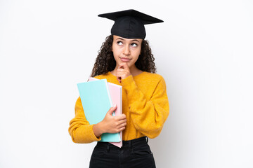 Arab university graduate woman holding books isolated on white background and looking up