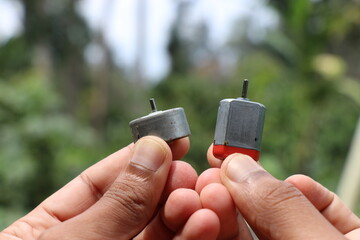 DC motor of two different types most commonly used in small radio controlled toys held in the hand...