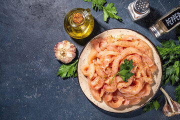 Raw chicken strips cooking background