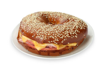 Delicious bagel with ham and cheese isolated on white