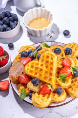 Breakfast belgian waffles with berry