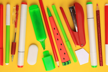 Flat lay composition with different school stationery on orange background. Back to school