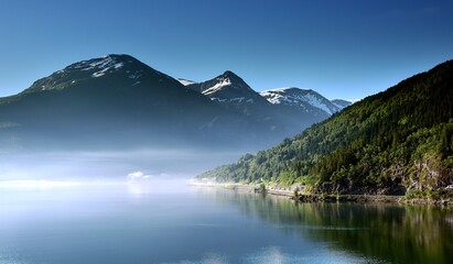 Sailing down Nordfjord into a cloud inversion