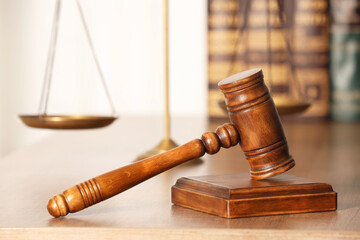 Law concept. Gavel on wooden table, closeup