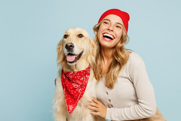 Young minded owner woman wear casual clothes red hat bandana hug cuddle embrace her best friend...