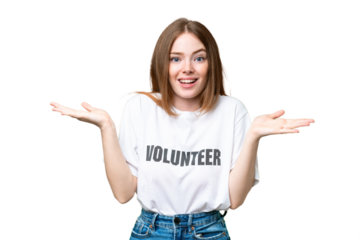 Young volunteer woman over isolated chroma key background with shocked facial expression