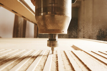 CNC milling machine. Machine tool in wood factory with drilling machines.
