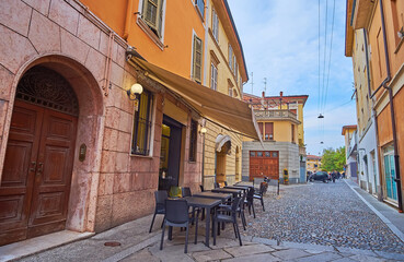 Outdoor dining on Via San Tomaso in Cremona, Italy