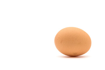Brown chicken egg isolated on a white background