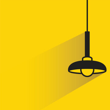 ceiling lamp with shadow on yellow background