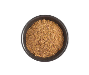 Bowl of aromatic caraway (Persian cumin) powder isolated on white, top view