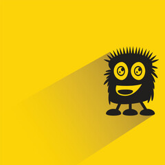 funny monster with shadow on yellow background