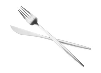 Shiny silver fork and knife isolated on white, top view. Luxury cutlery