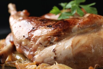 Tasty cooked rabbit meat with vegetables, closeup